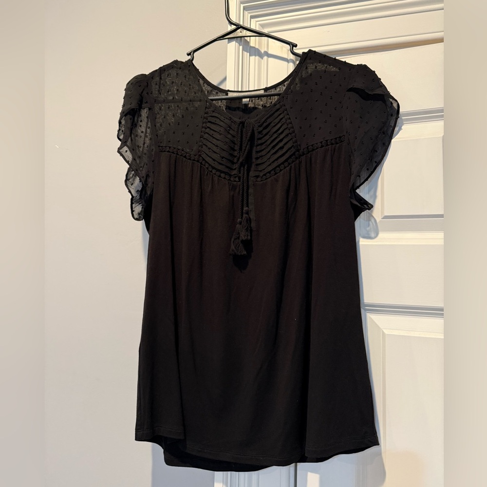 Daniel Rainn tank top like with a very short sleeve